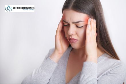 Woman holding her temples with a pained expression, indicating a headache. The logo "Within Normal Limits Physical Therapy" appears in the top left corner.