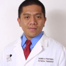A man wearing a white lab coat, blue shirt, and red tie poses for a formal portrait against a plain background. The coat has a name tag reading "Dennis A. Ponteres, Physical Therapist. A man wearing a white lab coat, blue shirt, and red tie poses for a formal portrait against a plain background. The coat has a name tag reading "Dennis A. Ponteres, Physical Therapist.